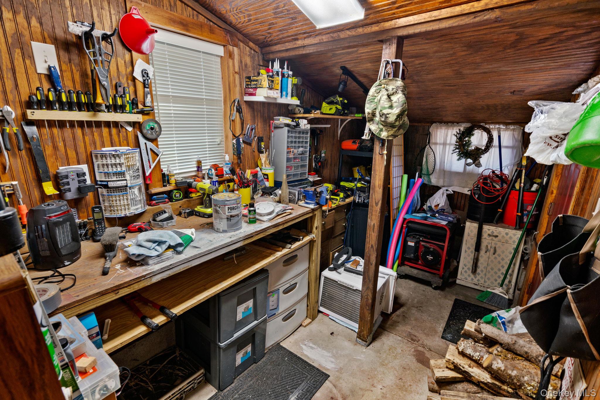 866 North Shore Road Hadley, NY 12835 - Photo 42 of 50 Attached workshop accessible from the home or through a separate entrance.