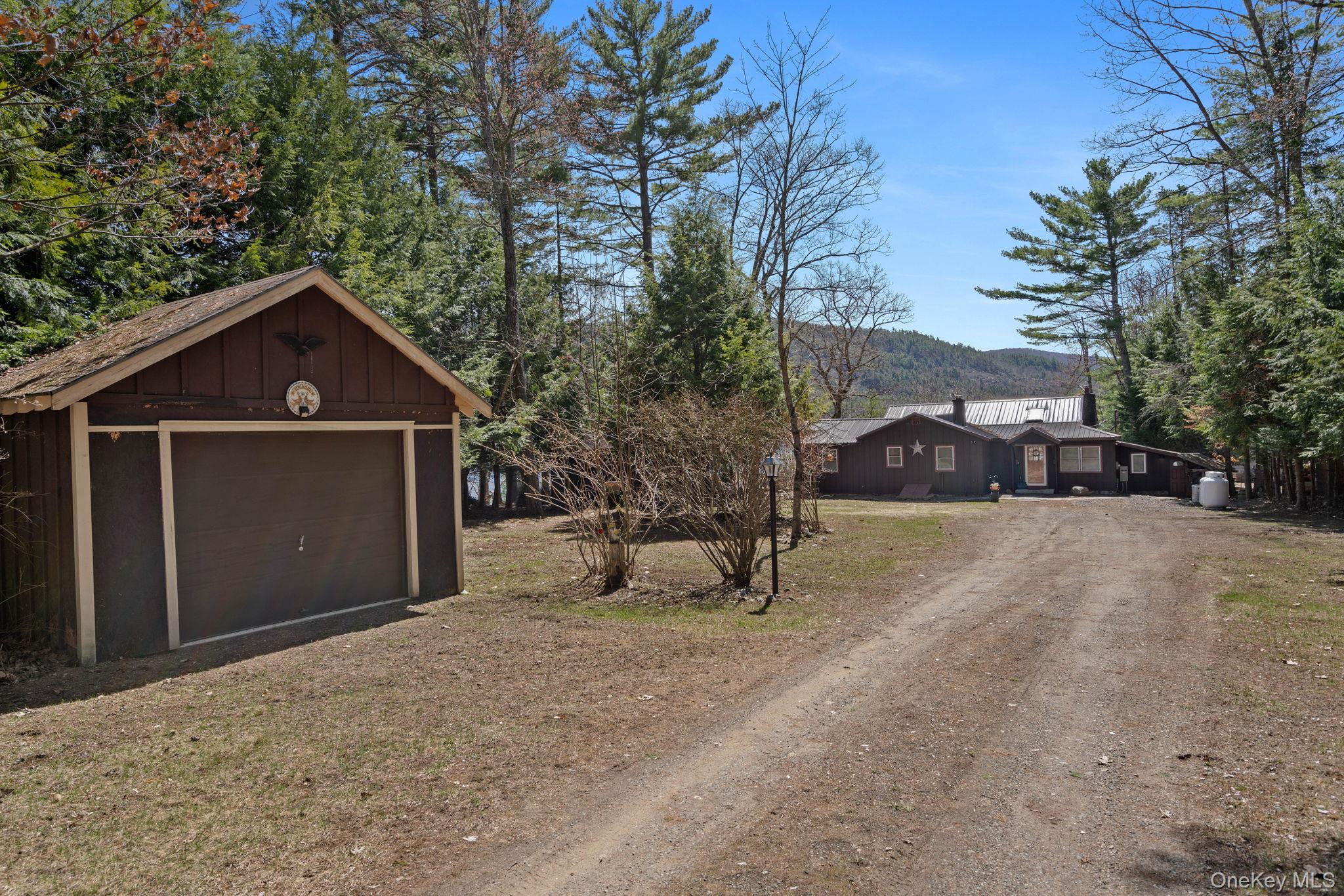 866 North Shore Road Hadley, NY 12835 - Photo 8 of 50 Situated far off the road in a quaint and private setting.