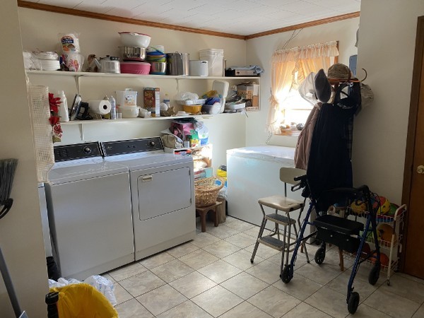 66 Union Hill Road Loretto, TN 38469 - Photo 22 of 31 a room with a chair and cabinets