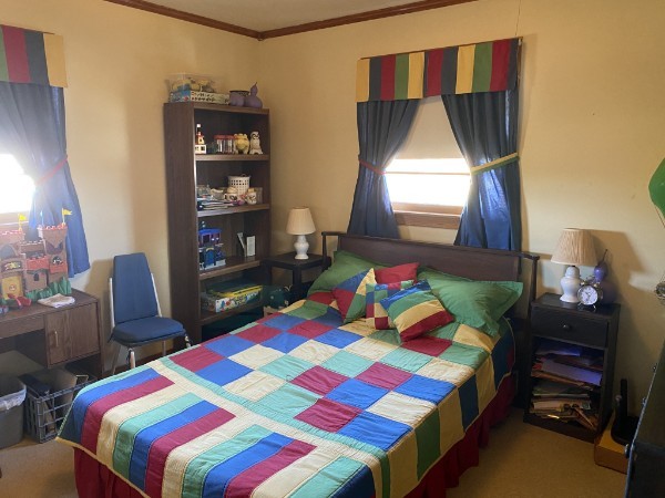 66 Union Hill Road Loretto, TN 38469 - Photo 24 of 31 a room that has a bed and a chair in it