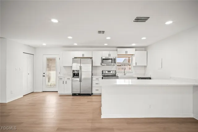 a view of room with window and screen