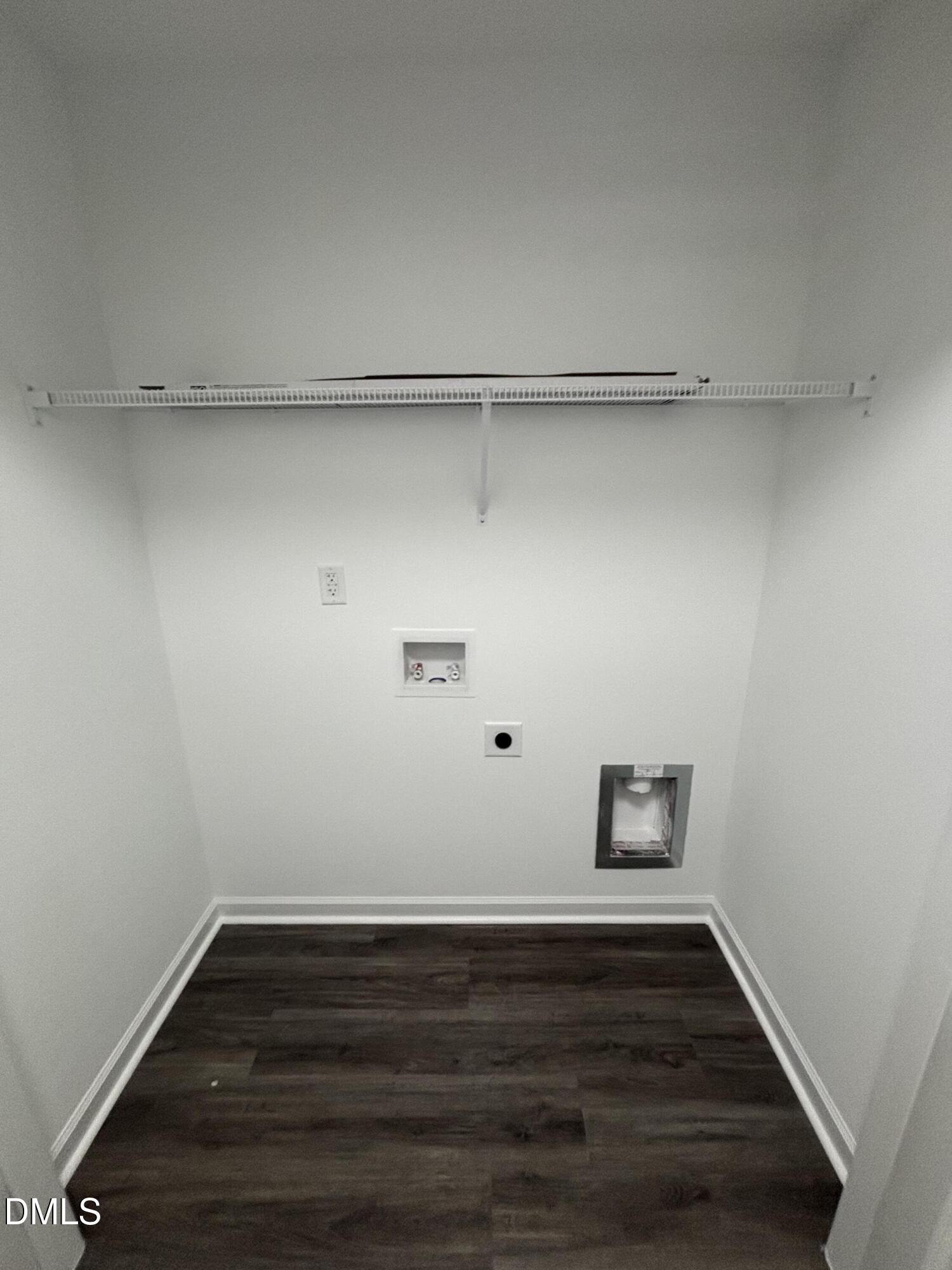 606 South Blackmon Street Benson, NC 27504 - Photo 14 of 25 a view of small space with racks on the wall