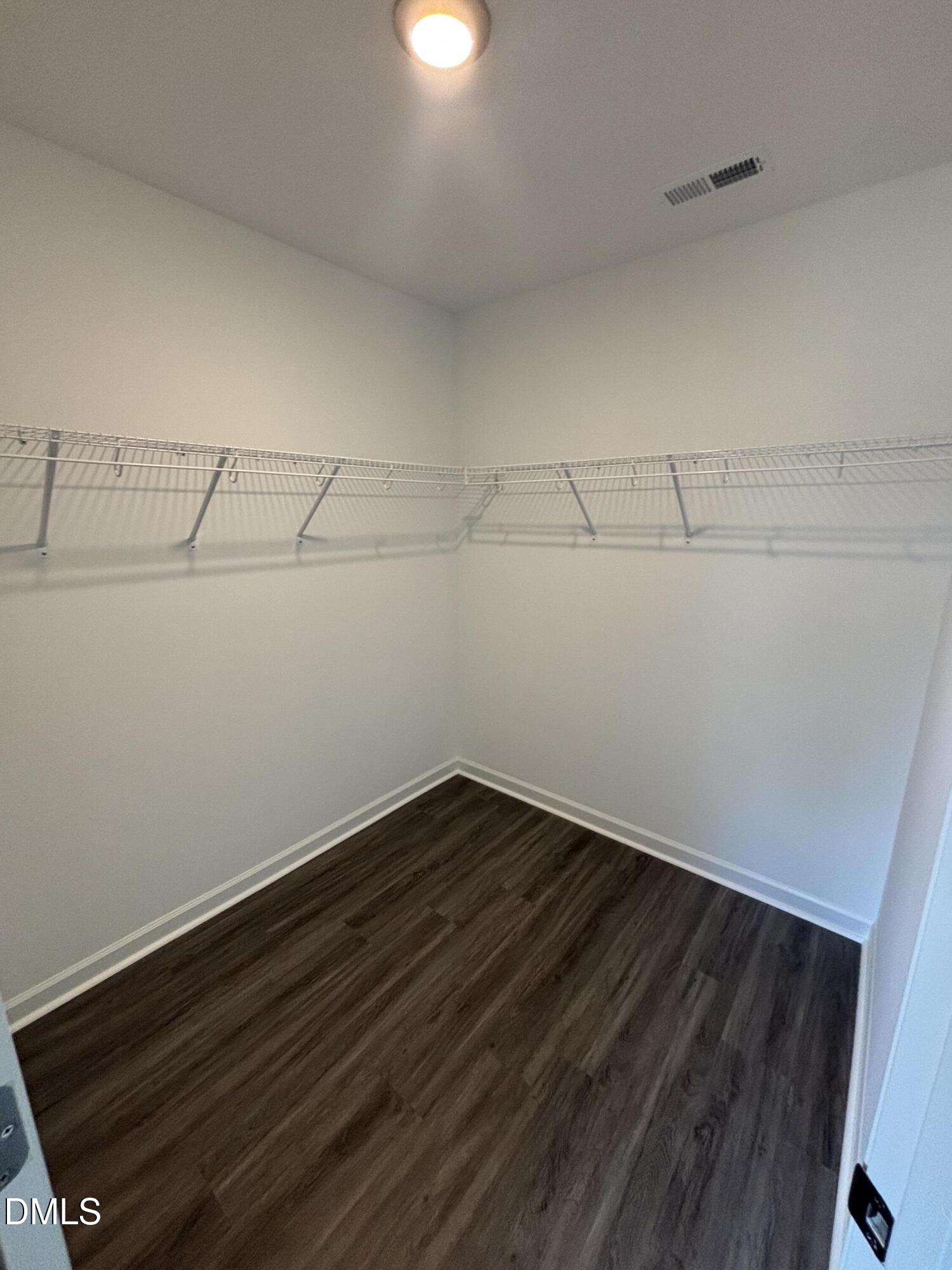 606 South Blackmon Street Benson, NC 27504 - Photo 15 of 25 a view of small space with racks on the wall