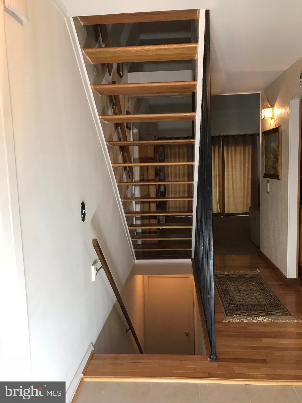 9449 Kilimanjaro Road Columbia, MD 21045 - Photo 5 of 30 Open Stairs Creates Stunning Entrance