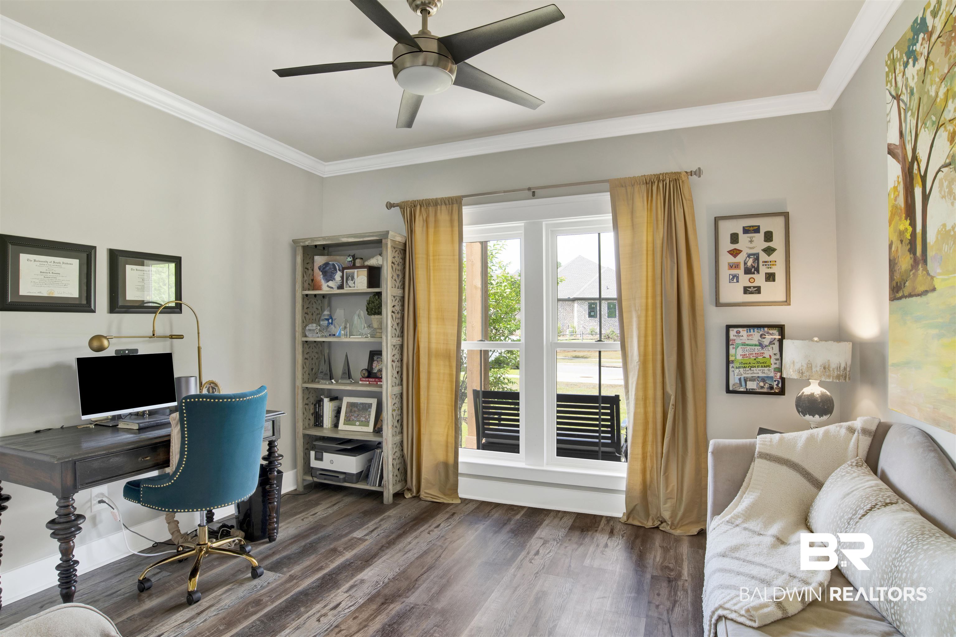 21621 Veranda Boulevard Fairhope, AL 36532 - Photo 11 of 51 Home office with dark wood-type flooring, ornamental molding, and a ceiling fan