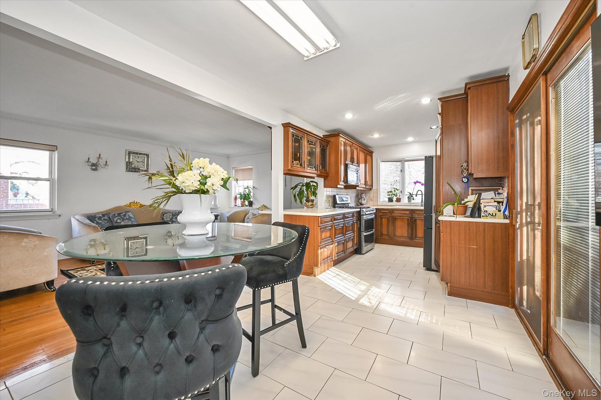 184-32 Cambridge Road Queens, NY 11432 - Photo 7 of 22 a view of a dining room with furniture