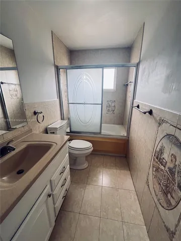 a view of a livingroom and window