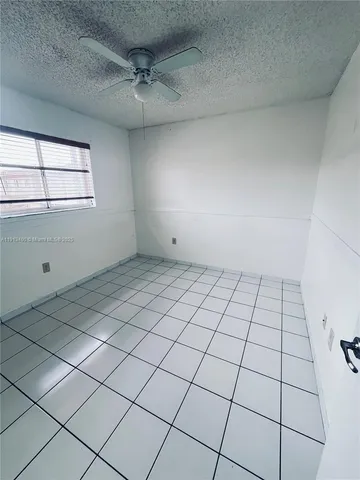 a view of a room and window