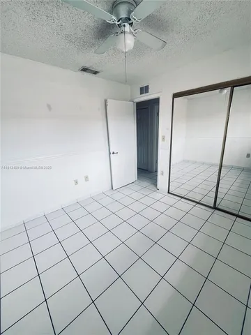 a view of a balcony with chairs