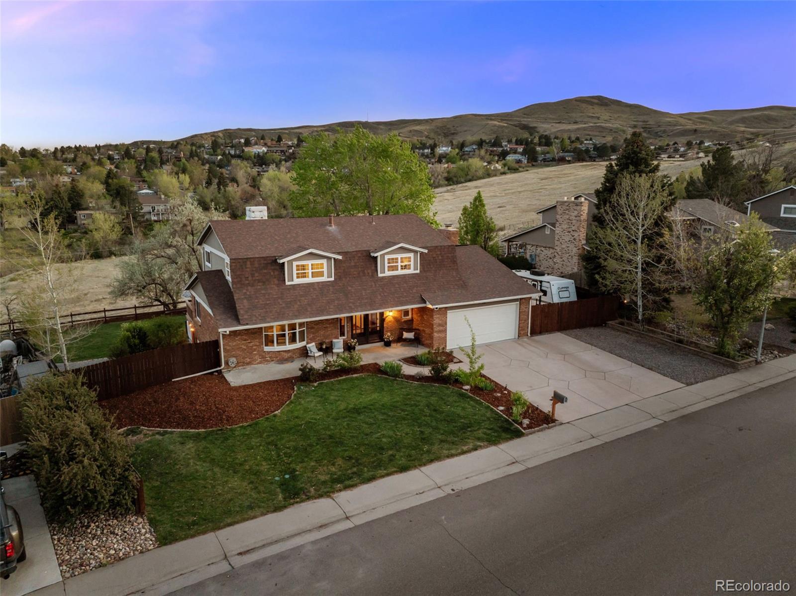 an aerial view of a house with a garden