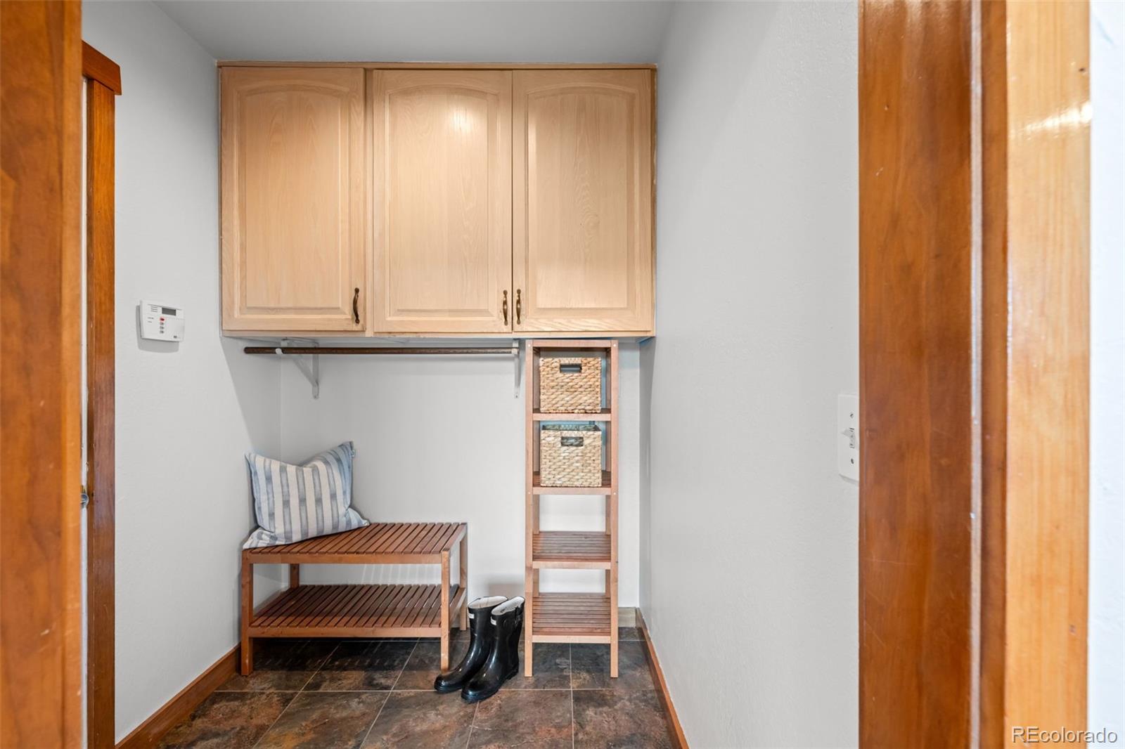 210 South Deframe Way Golden, CO 80401 - Photo 22 of 50 a view of room with wooden floor and chair