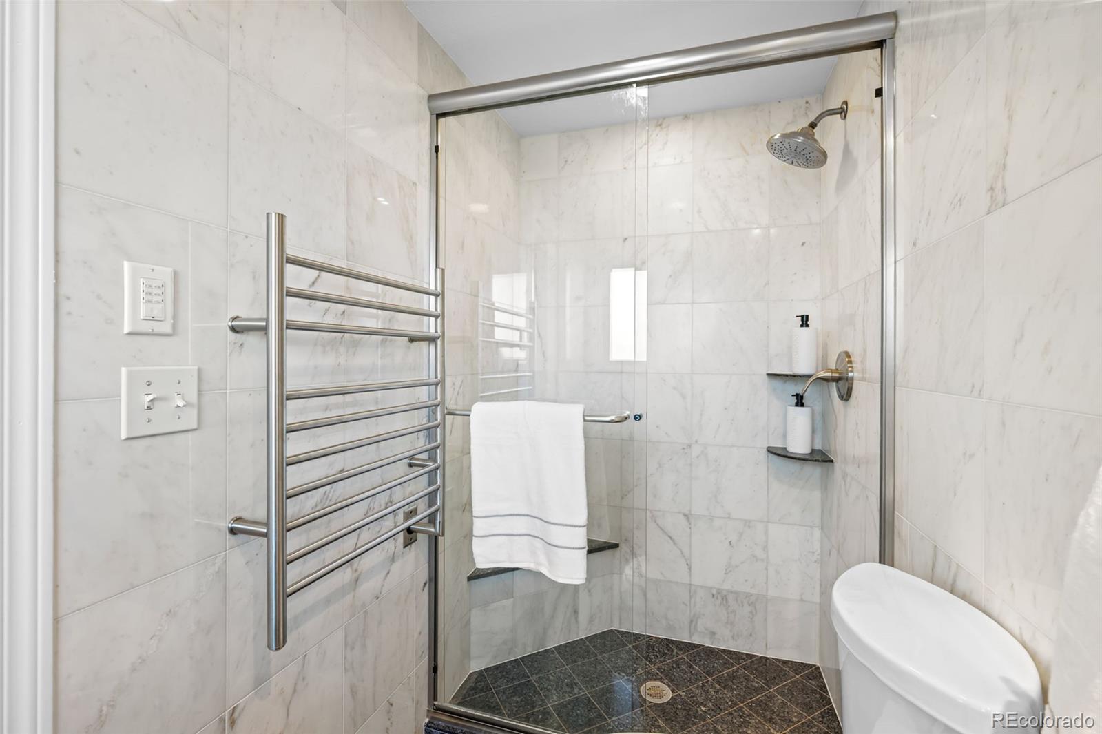 210 South Deframe Way Golden, CO 80401 - Photo 26 of 50 a bathroom with a shower and toilet
