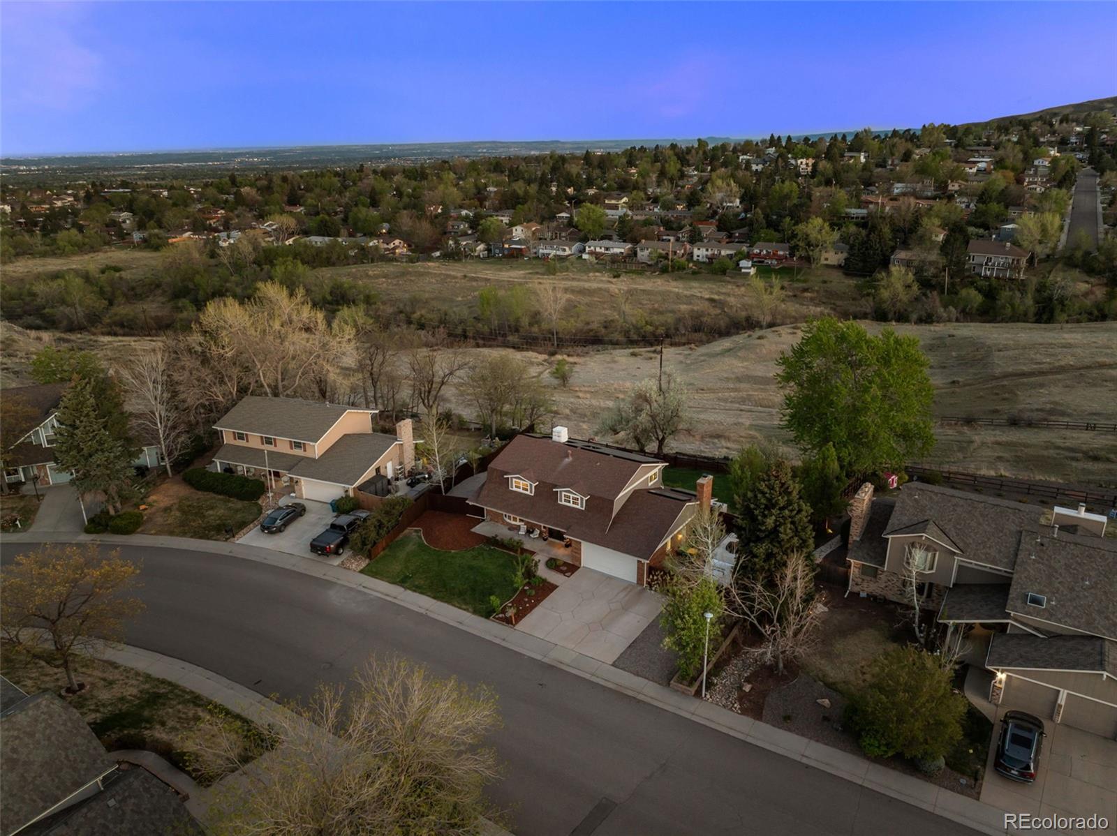 210 South Deframe Way Golden, CO 80401 - Photo 3 of 50 an aerial view of a house with a lake view