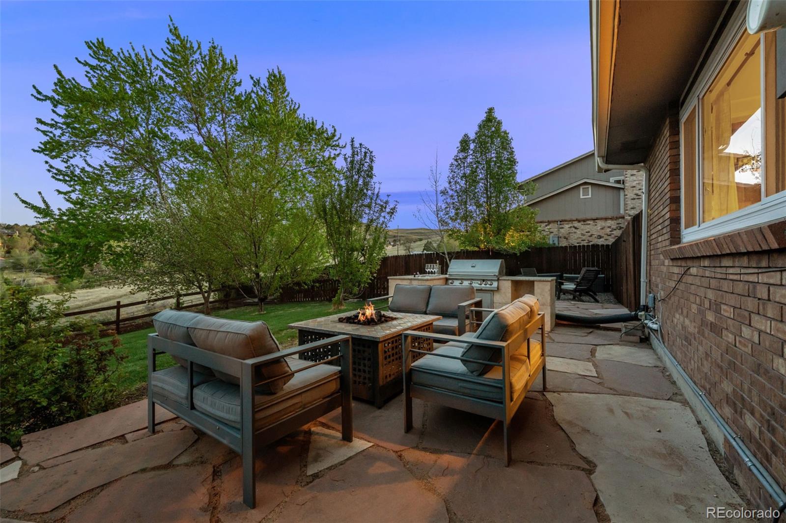 210 South Deframe Way Golden, CO 80401 - Photo 39 of 50 a view of a patio with table and chairs and a potted plant