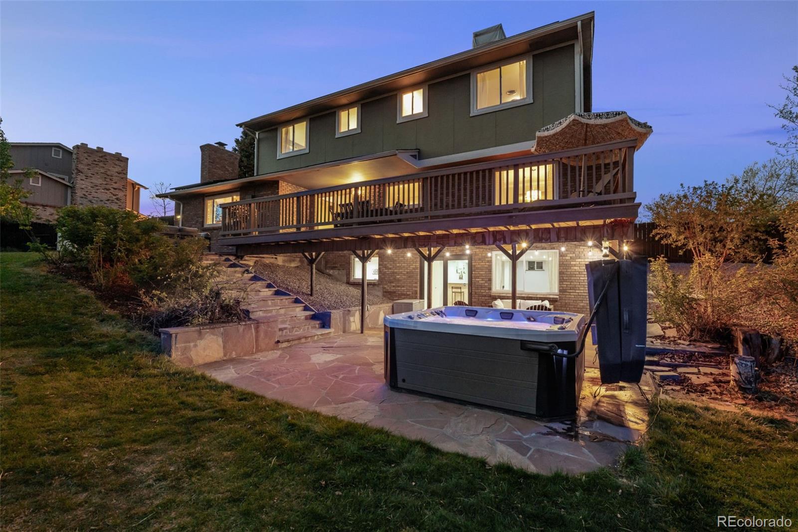 210 South Deframe Way Golden, CO 80401 - Photo 46 of 50 a front view of a house with a yard