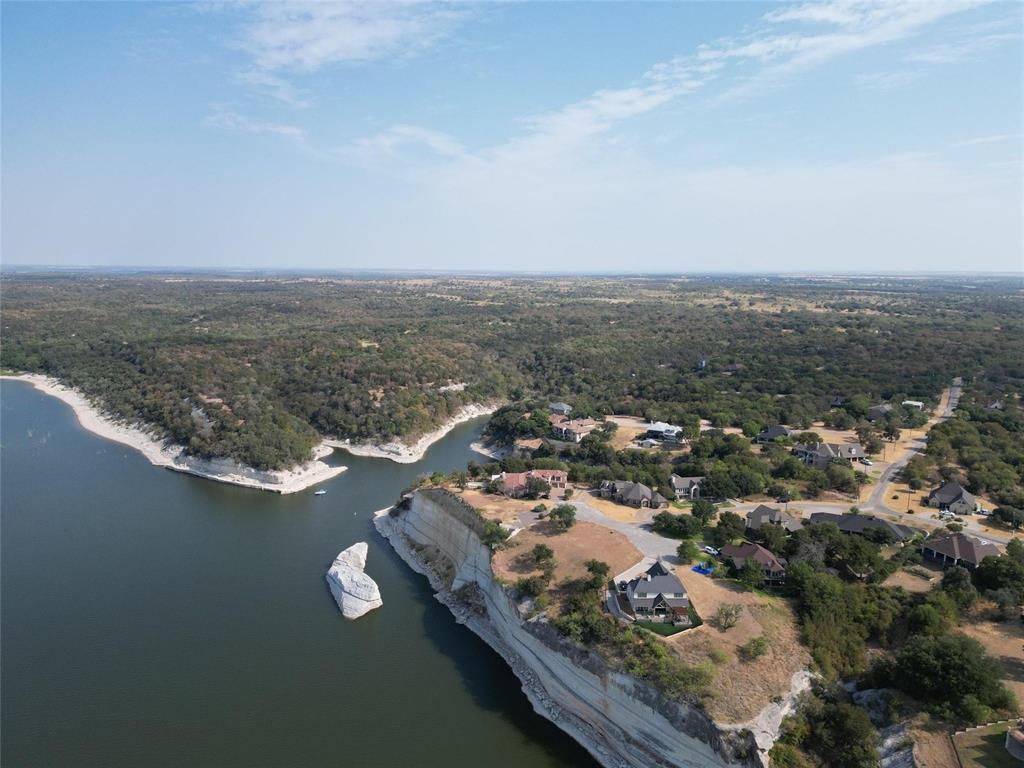 1233 Overlook Court Whitney, TX 76692 - Photo 15 of 34 an aerial view of residential building and ocean