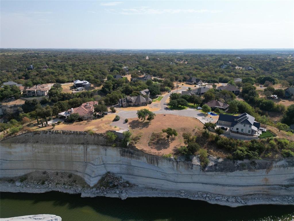 1233 Overlook Court Whitney, TX 76692 - Photo 19 of 34 an aerial view of a house with a yard