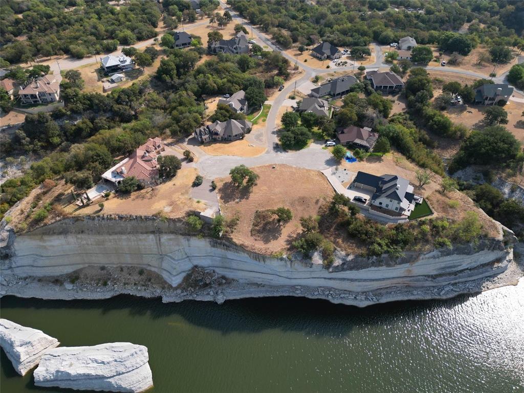 1233 Overlook Court Whitney, TX 76692 - Photo 4 of 34 a view of a lake with a yard