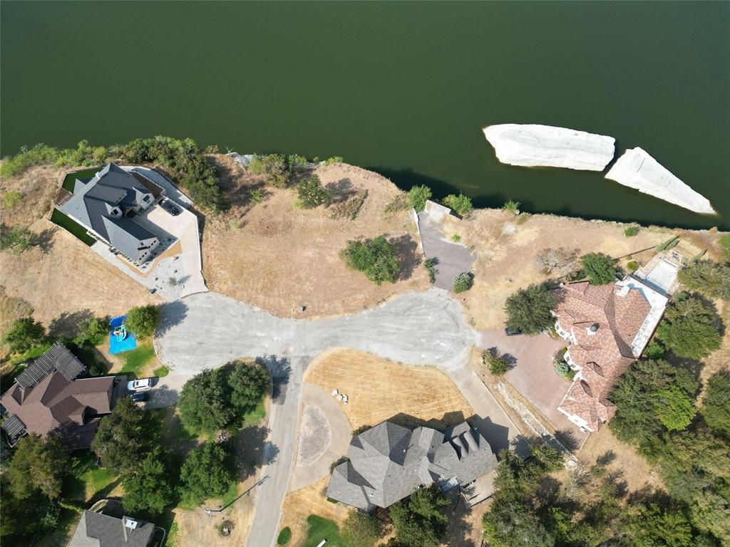 1233 Overlook Court Whitney, TX 76692 - Photo 5 of 34 an aerial view of a house with a yard
