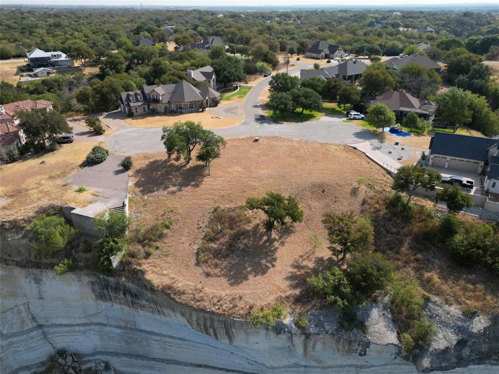 1233 Overlook Court Whitney, TX 76692 - Photo 6 of 34 an aerial view of residential houses with outdoor space