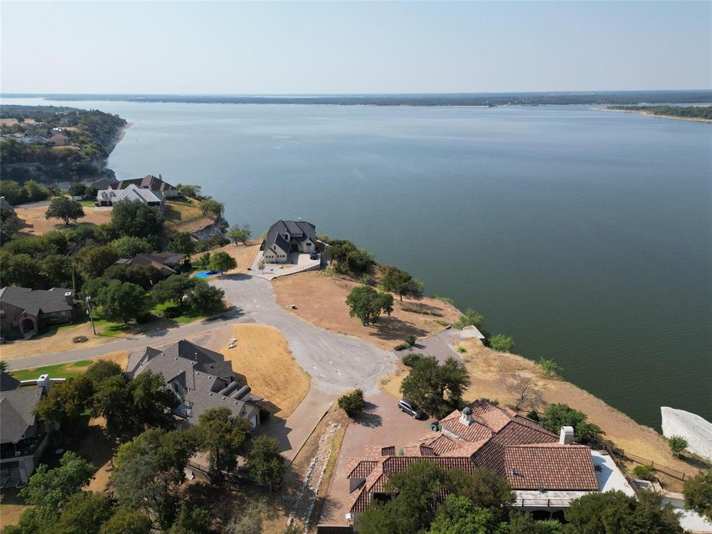 1233 Overlook Court Whitney, TX 76692 - Photo 9 of 34 an aerial view of a house with ocean view