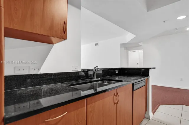 a close view of sink and mirror