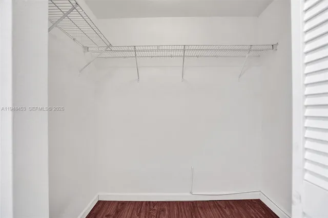 a view of a room with racks on the wall