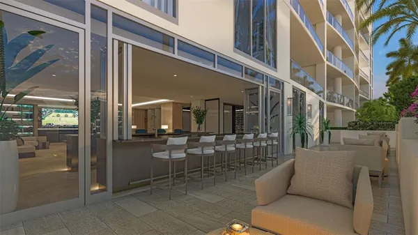 a view of a building with sitting area