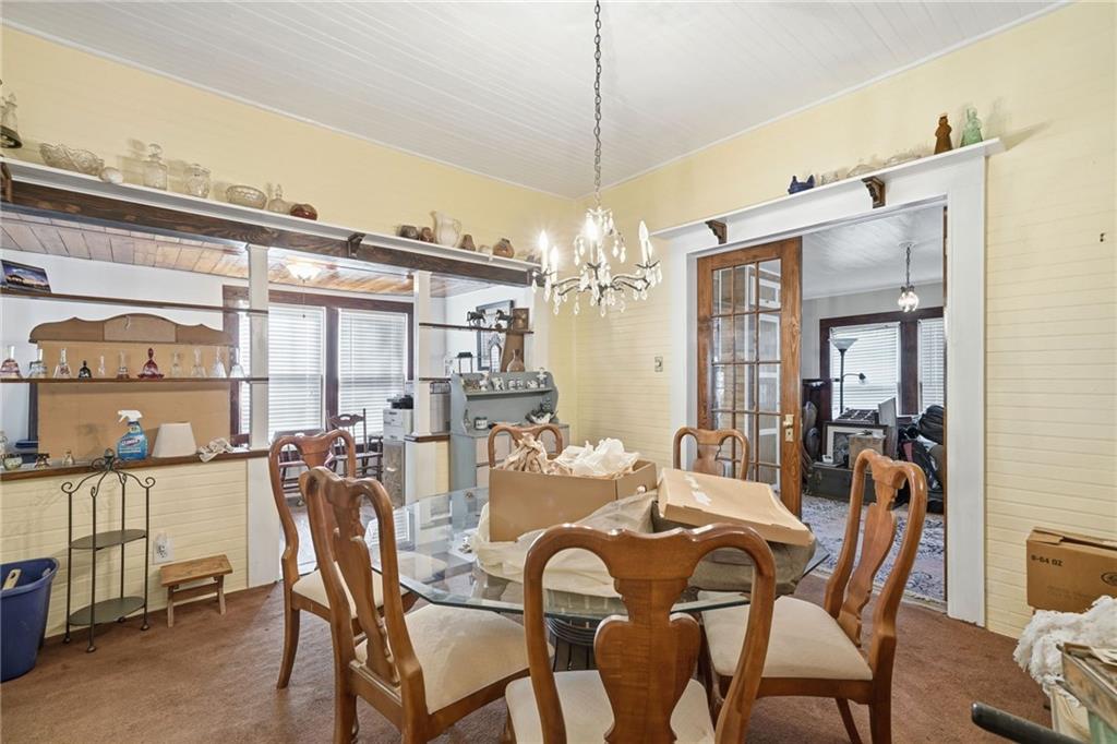 348 Old Tate Road Jasper, GA 30143 - Photo 17 of 35 a view of a dining room with furniture window and outside view