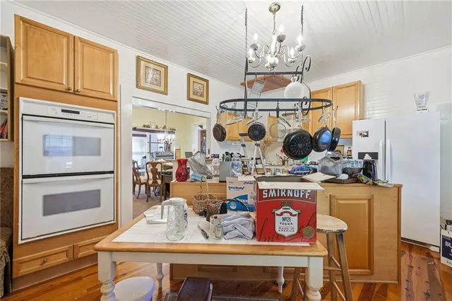 a view of dining table and chairs