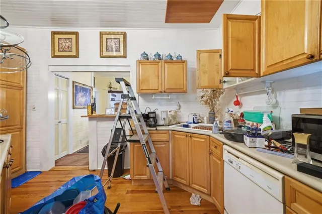 a view of a kitchen with a sink