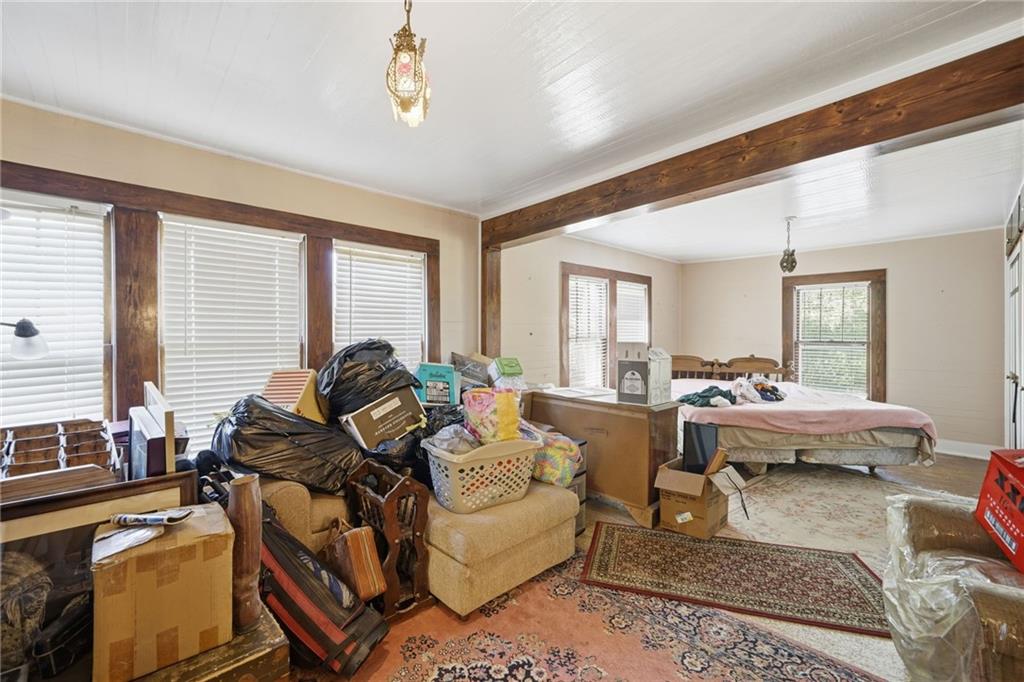 348 Old Tate Road Jasper, GA 30143 - Photo 23 of 35 a living room with furniture and a large window