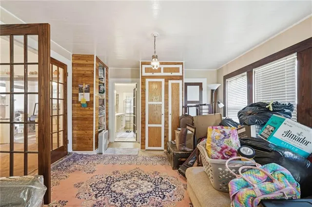 a bedroom with furniture and a bed