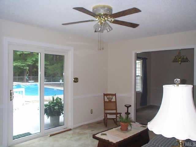 5412 Live Oak Trail Raleigh, NC 27613 - Photo 4 of 10 a living room with furniture and a window