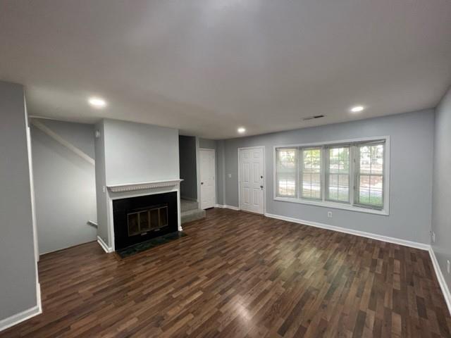 236 Chads Ford Way Roswell, GA 30076 - Photo 15 of 24 a view of an empty room with a fireplace and a window