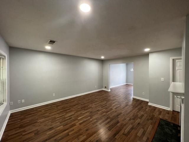 236 Chads Ford Way Roswell, GA 30076 - Photo 16 of 24 an empty room with wooden floor and windows