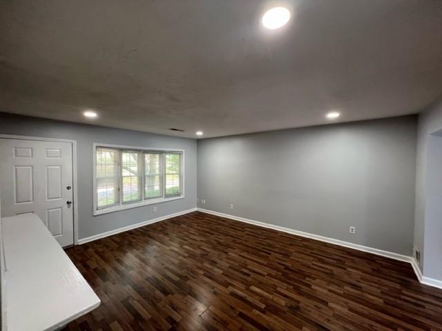 236 Chads Ford Way Roswell, GA 30076 - Photo 17 of 24 an empty room with wooden floor and windows