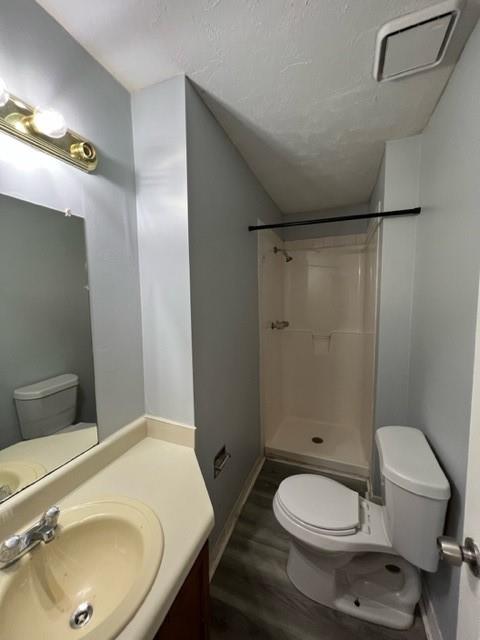 236 Chads Ford Way Roswell, GA 30076 - Photo 19 of 24 a bathroom with a sink toilet and shower