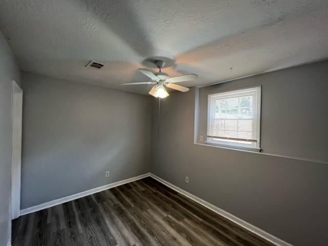 236 Chads Ford Way Roswell, GA 30076 - Photo 20 of 24 an empty room with a window and a fan
