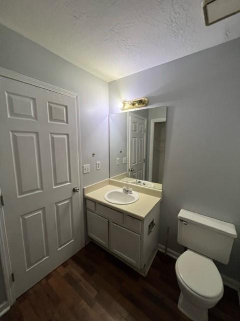 236 Chads Ford Way Roswell, GA 30076 - Photo 2 of 24 a bathroom with a toilet sink and mirror