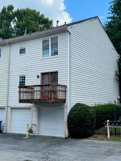 236 Chads Ford Way Roswell, GA 30076 - Photo 21 of 24 a view of a white house with large windows