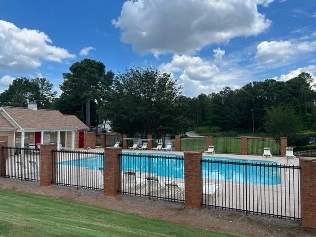 an outdoor view of a house having patio