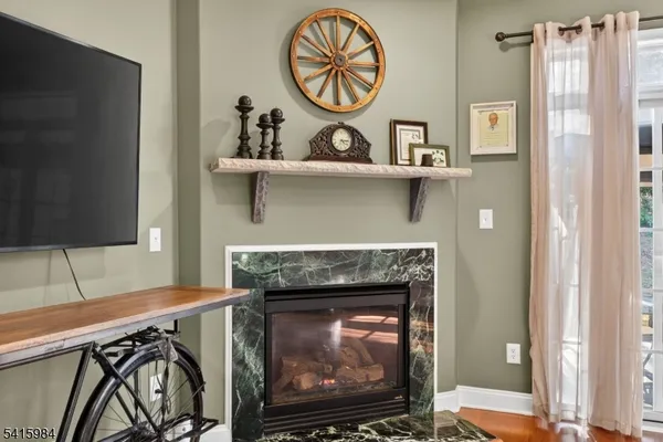 a fireplace with a clock on top of it
