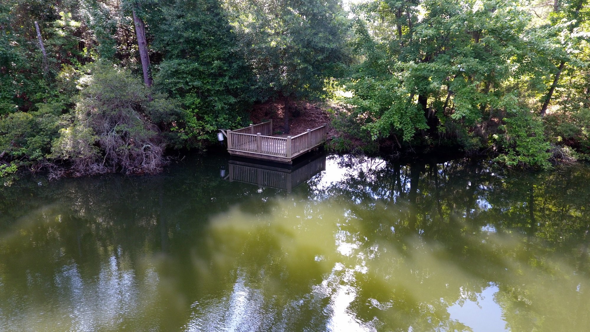 91 Bluejay Way Cleveland, TX 77327 - Photo 12 of 35 a view of lake with green space