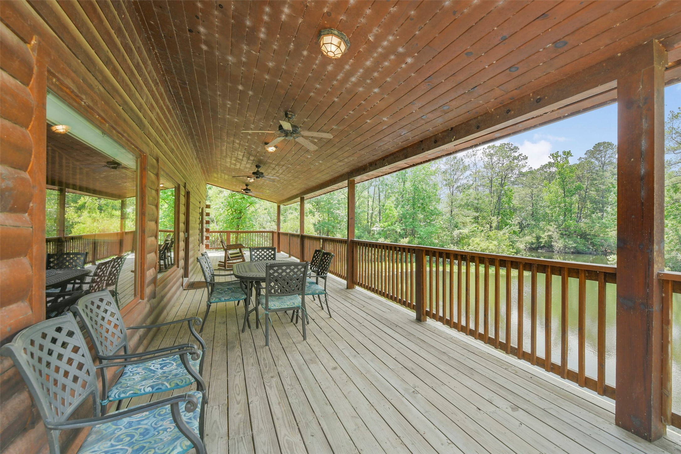 91 Bluejay Way Cleveland, TX 77327 - Photo 13 of 50 a view of a two chairs in the balcony