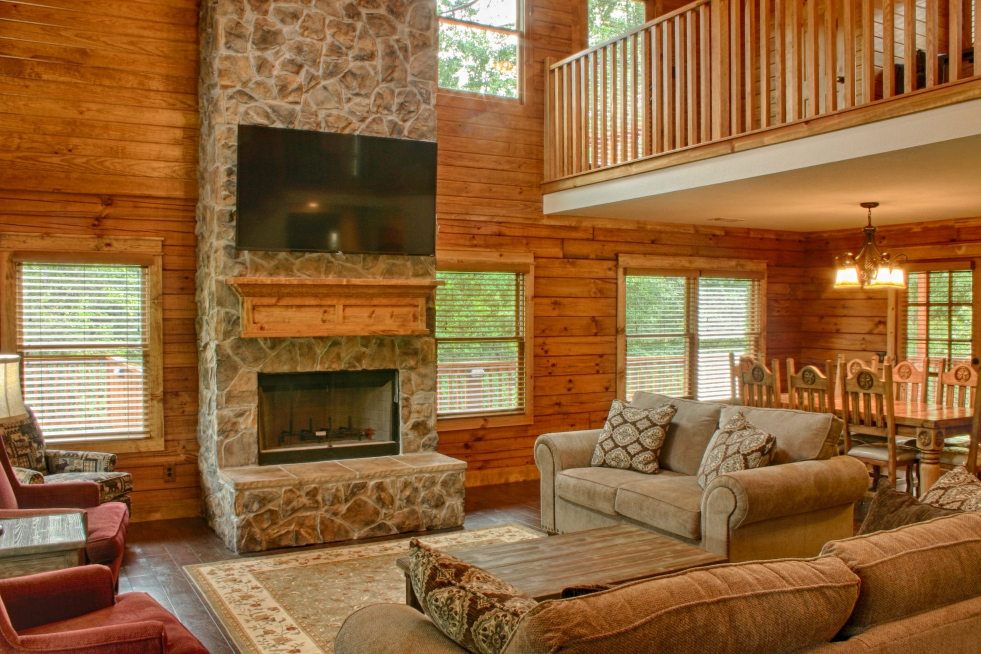 91 Bluejay Way Cleveland, TX 77327 - Photo 13 of 35 a living room with furniture a flat screen tv and a fireplace