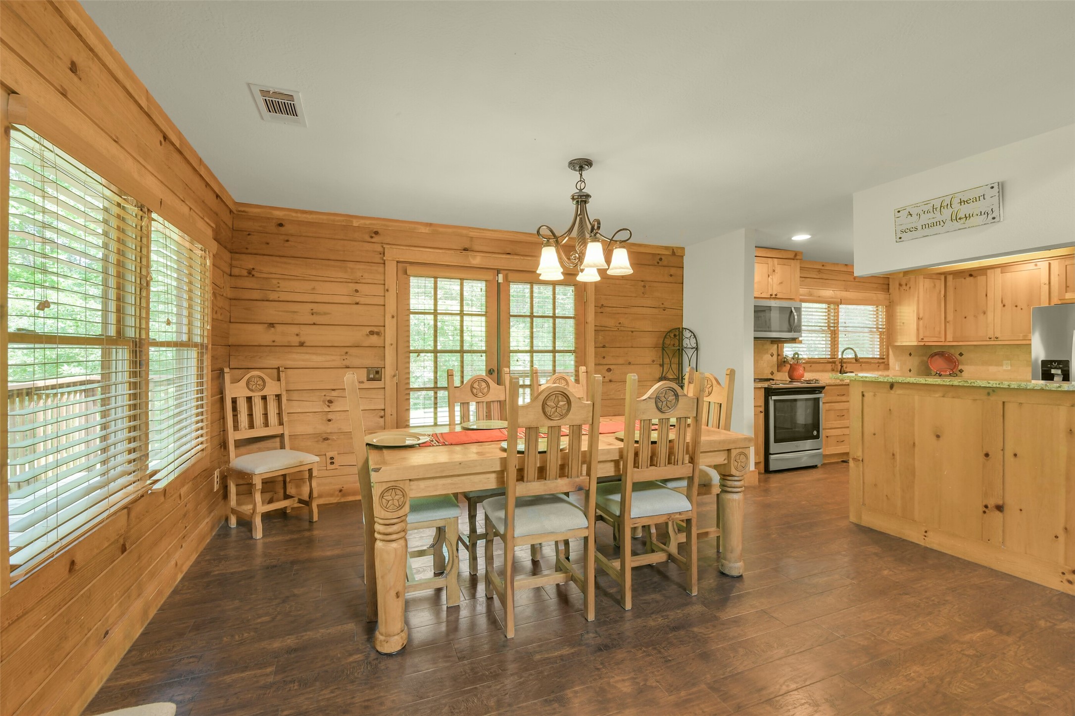 91 Bluejay Way Cleveland, TX 77327 - Photo 20 of 50 a view of a dining room with furniture window and outside view