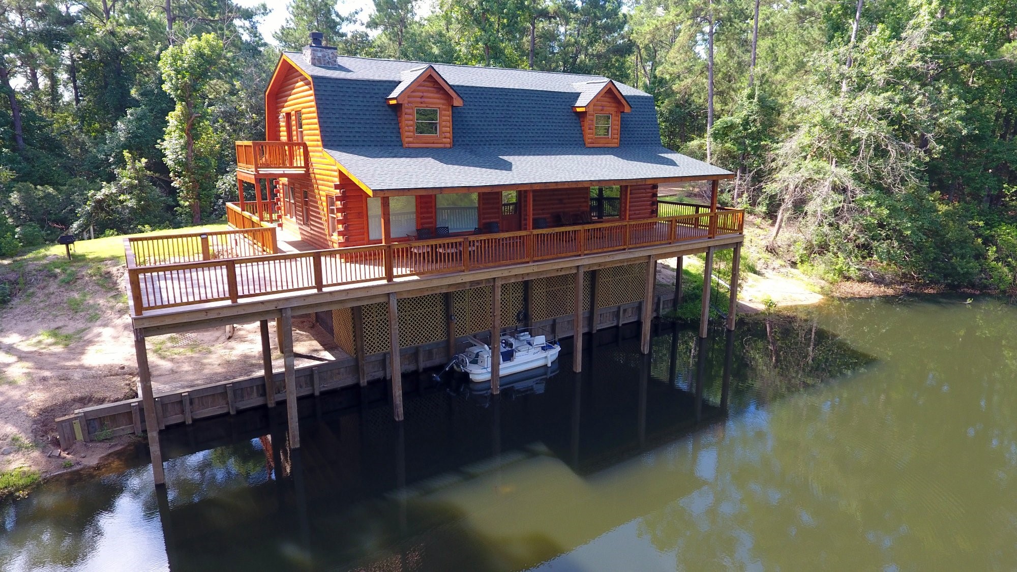 91 Bluejay Way Cleveland, TX 77327 - Photo 2 of 35 a view of a balcony with two chairs and a table