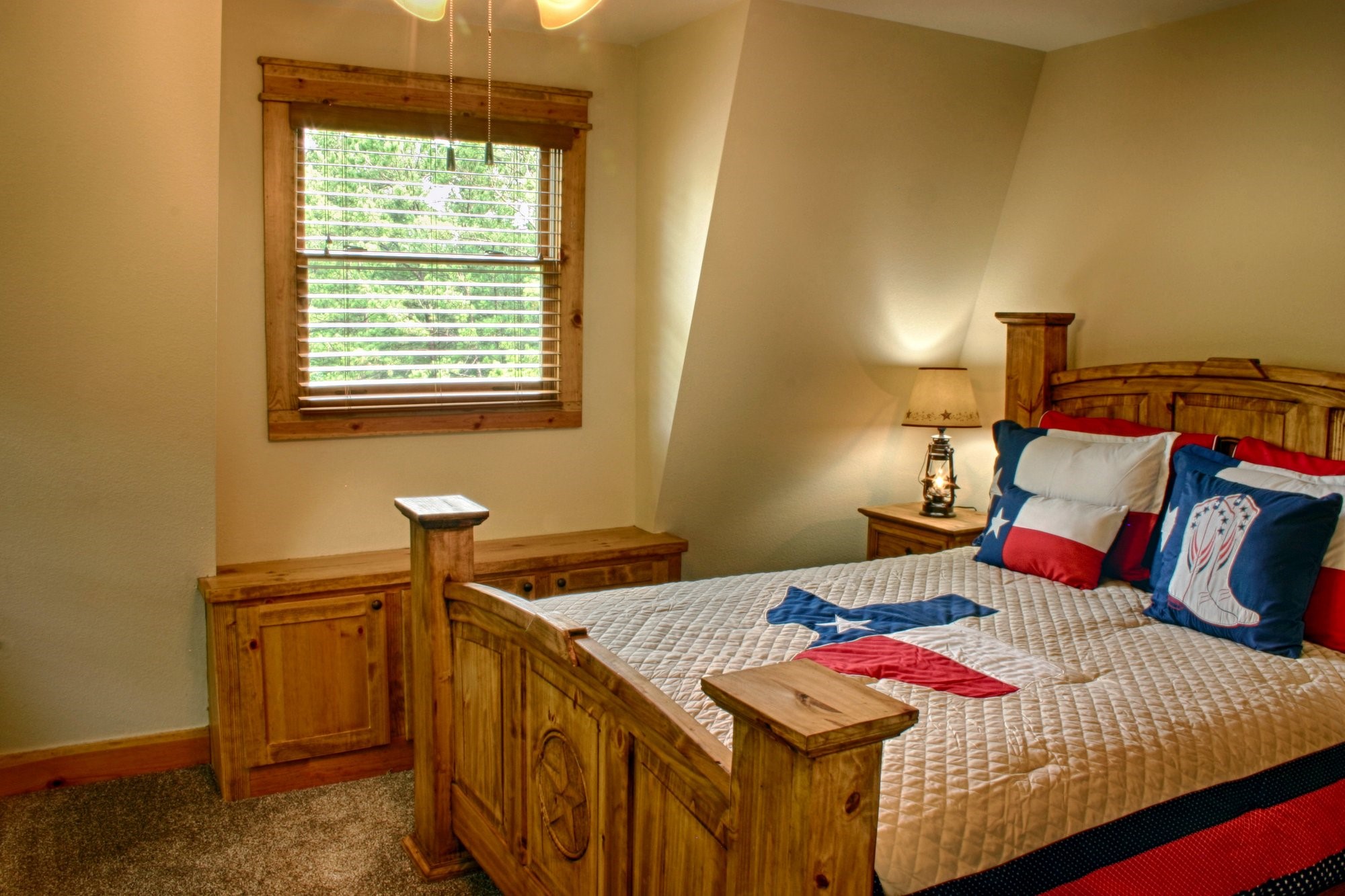 91 Bluejay Way Cleveland, TX 77327 - Photo 25 of 35 a bedroom with a bed and two windows