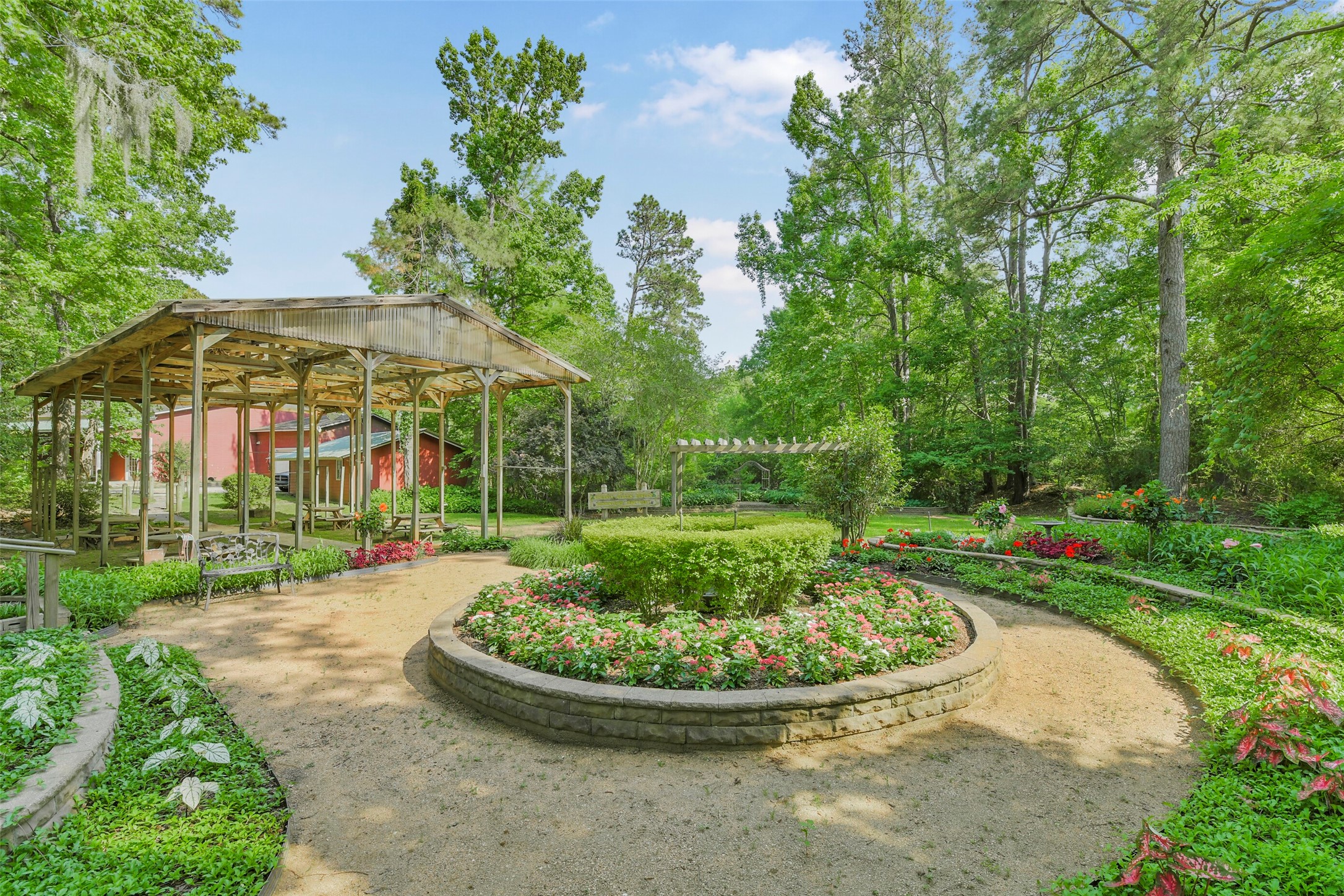 91 Bluejay Way Cleveland, TX 77327 - Photo 50 of 50 a view of a garden with a fountain